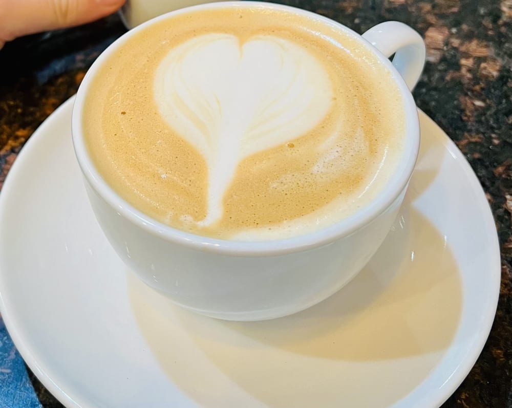 Cappuccino with heart-shaped latte art