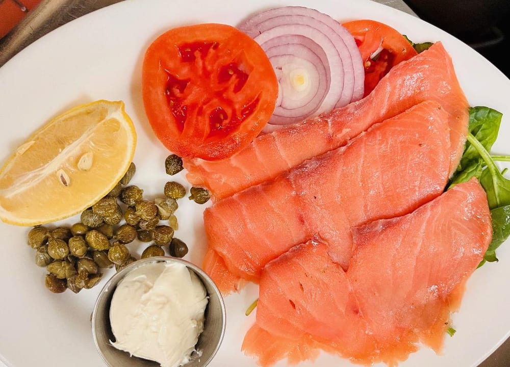 Norwegian smoked salmon platter with capers and lemon